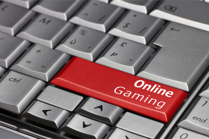 Computer key that says Online Gaming