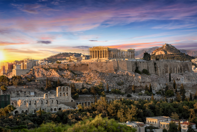 The Parthenon Temple at the Acropolis of Athens, Greece, during colorful sunset